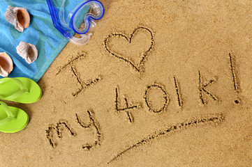 The words I love my 401k written in sand on a beach with towel flip flops and seashells old age summer holiday vacation photo