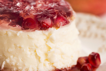 coconut panna cotta dessert with pomegranate