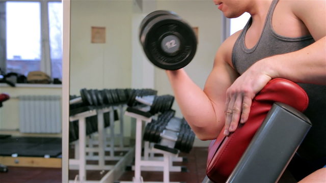 A man trains in a gym