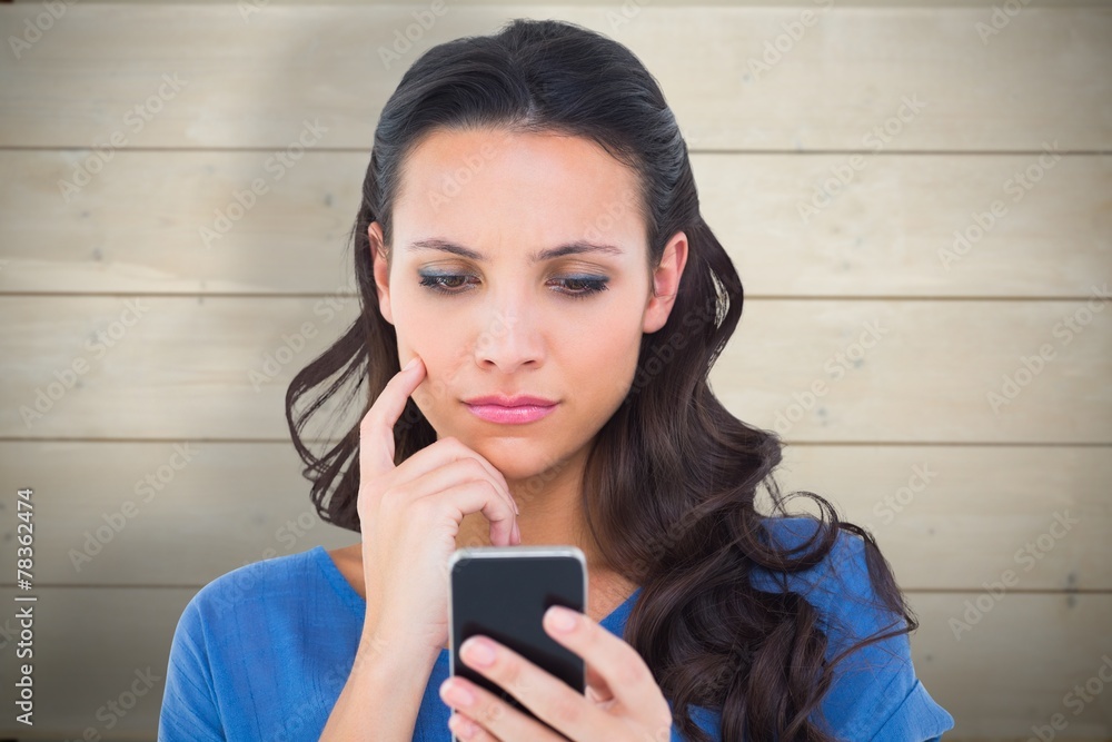 Poster Composite image of pretty brunette sending a text