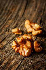 Walnut close up (macro) on vintage wood background