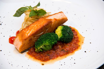 Stake from a salmon with vegetables