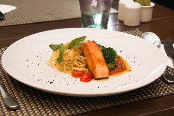 Stake from a salmon with vegetables