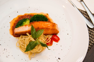 Stake from a salmon with vegetables