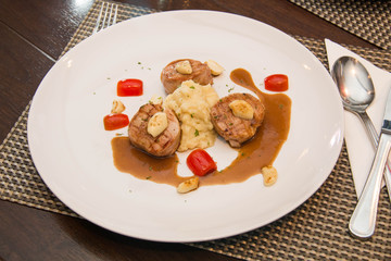 Mashed potatoes and beef steak