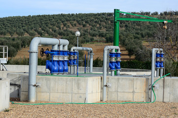Fototapeta na wymiar water treatment plant with valves and pipes
