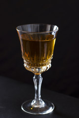 Glass is filled with alcohol