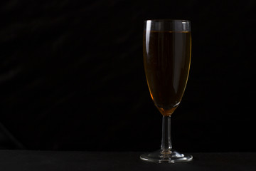 Glass is filled with alcohol