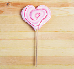 lollipop on a wooden background 