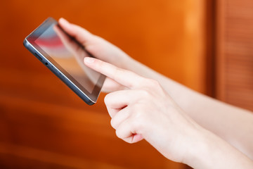 finger touching touchpad in office