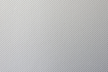 Macro of a silver cardboard texture with a squared pattern