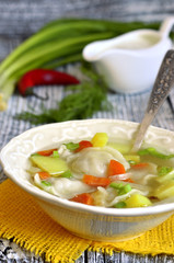 Vegetable soup with pelmeni.