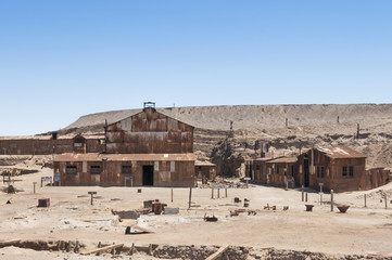 Rusted buildings in the saltpeter works of Humberstone, Chile