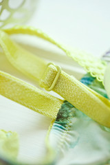 Green lingerie with orchids. Spring mood.