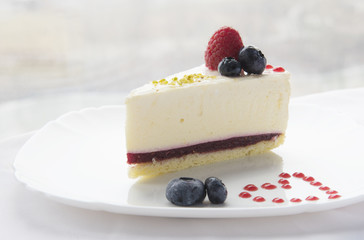 Piece of cheesecake with berries