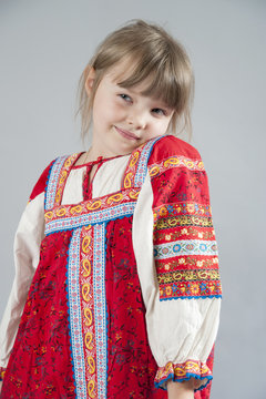 Little Girl In A Cunning Russian Folk Costume..