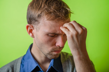 Obraz premium Businessman with headache pinching top of his nose