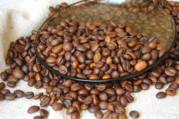 Fototapeta premium Coffee beans on a plate