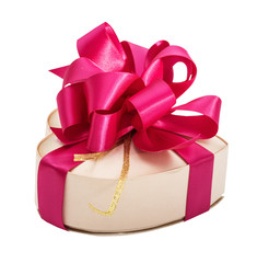 Silk box in form of heart, with a bright lilac bow, isolated