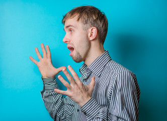 Angry young man shouting