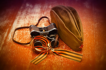 Military garrison cap,  binoculars, George Ribbon