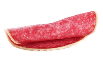 Slice of salami isolated on white background