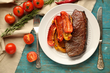 Composition with tasty roasted meat  and vegetables