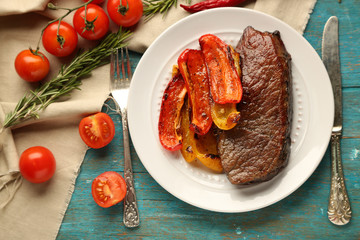 Composition with tasty roasted meat  and vegetables