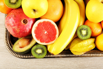 Assortment of fruits on wooden table
