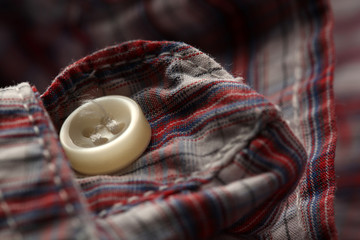 Button on clothes close up