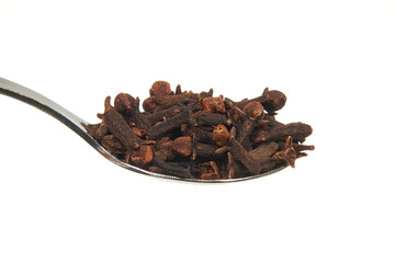 Dried Cloves on a teaspoon