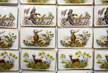 Wild animal motifs on handmade porcelain fridge magnets. Hunting