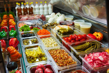 Fototapeta na wymiar Variety of pickled foods in a store