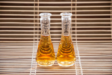 Glasses with rakija on a bamboo background