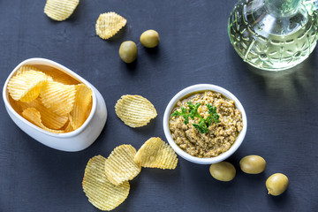 Potato chips with olive pate