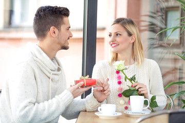 Young couple in a coffee shop on Valentine's Day