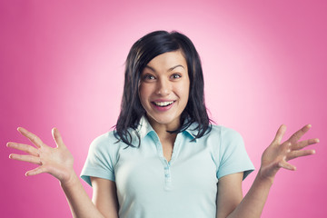 Wonderful news: Excited joyful girl looking surprised.