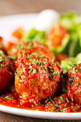Meatballs with salad