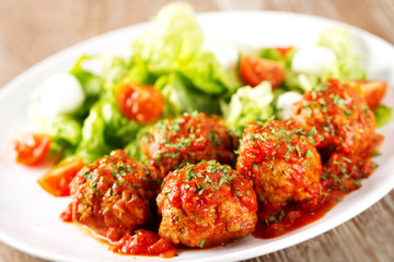 Meatballs with salad