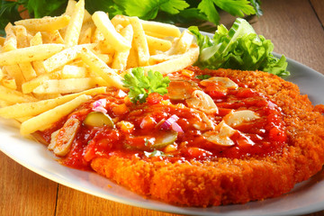 Tasty Crumbled Zigeunerschnitzel Paired with Fries