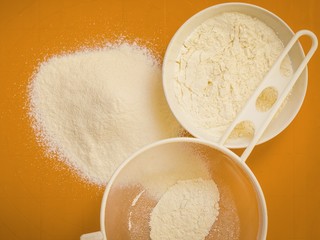Preparation for baking, ingredients flour sifting.