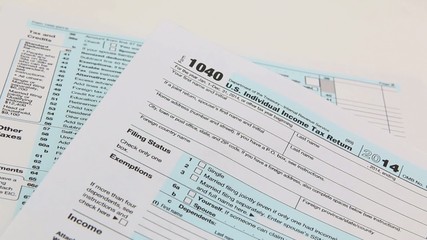 Tax accounting form 1040. Finance concept