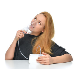 woman using nebulizer for respiratory inhaler Asthma Treatment