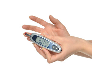 Diabetes patient hands measuring glucose level blood test