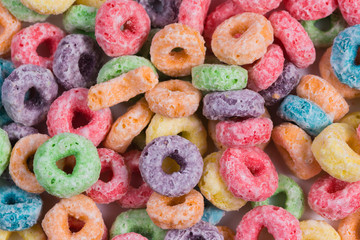 Bright colored o shaped cereal background