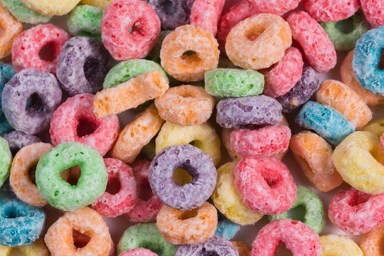 Bright colored o shaped cereal background