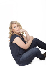Fototapeta premium Beautiful young woman in late teens or early twenties isolated