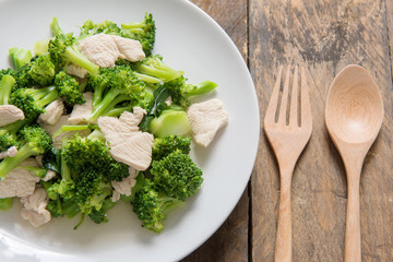 Broccoli Fried in wooden background