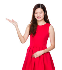 Asian woman with hand presentation