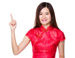 Chinese woman with finger point upwards